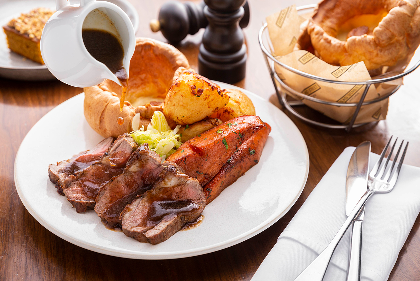 Bread Street Kitchen Lamb rump, roasted potatoes, savoy cabbage, carrots, Yorkshire pudding, onion gravy (Marina Bay Sands)