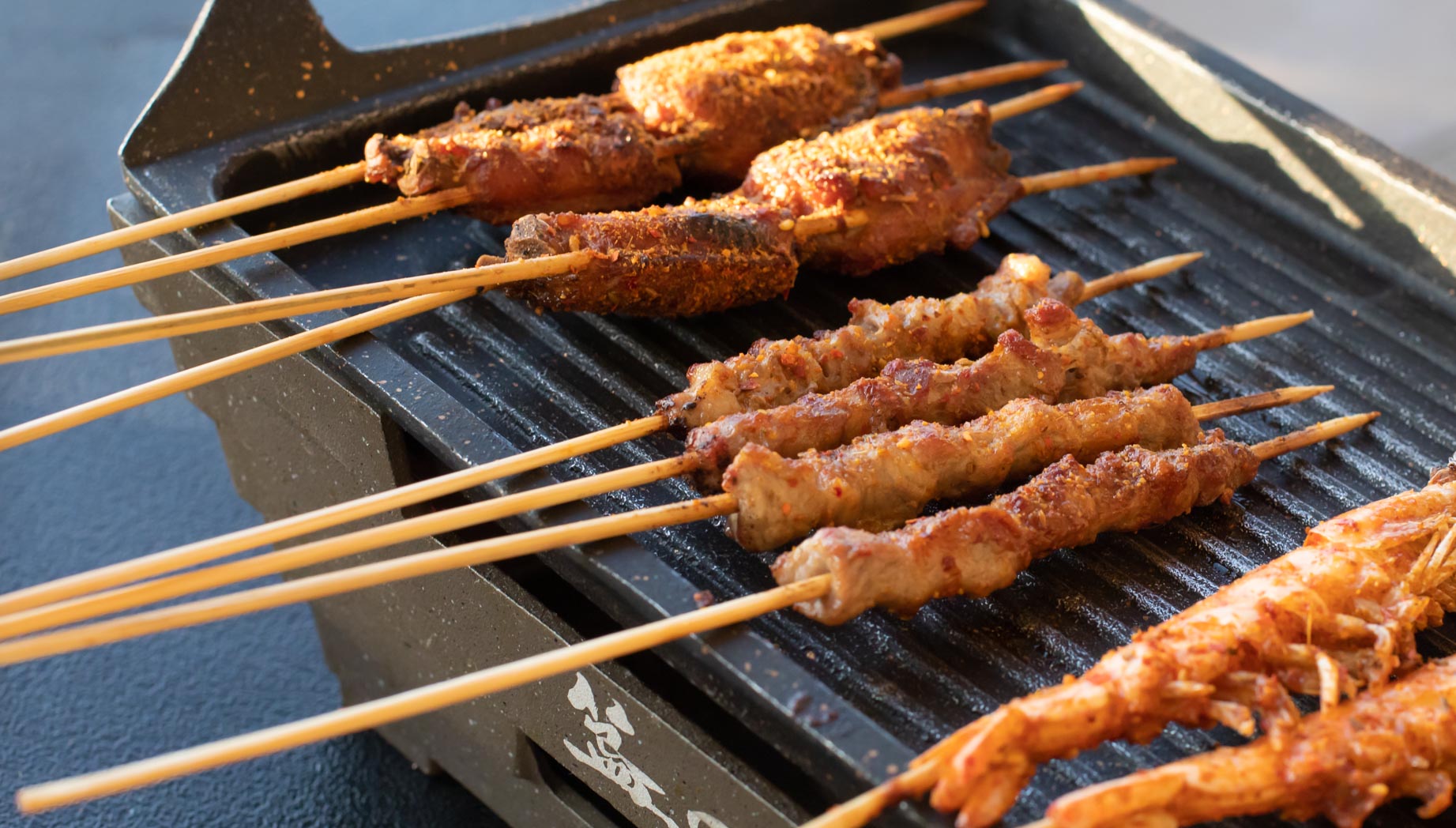 Signature Wings and Lamb Skewers at Gui BBQ Restaurant & Bar (Photo by: Julie Nguyen/SNAP TASTE®)