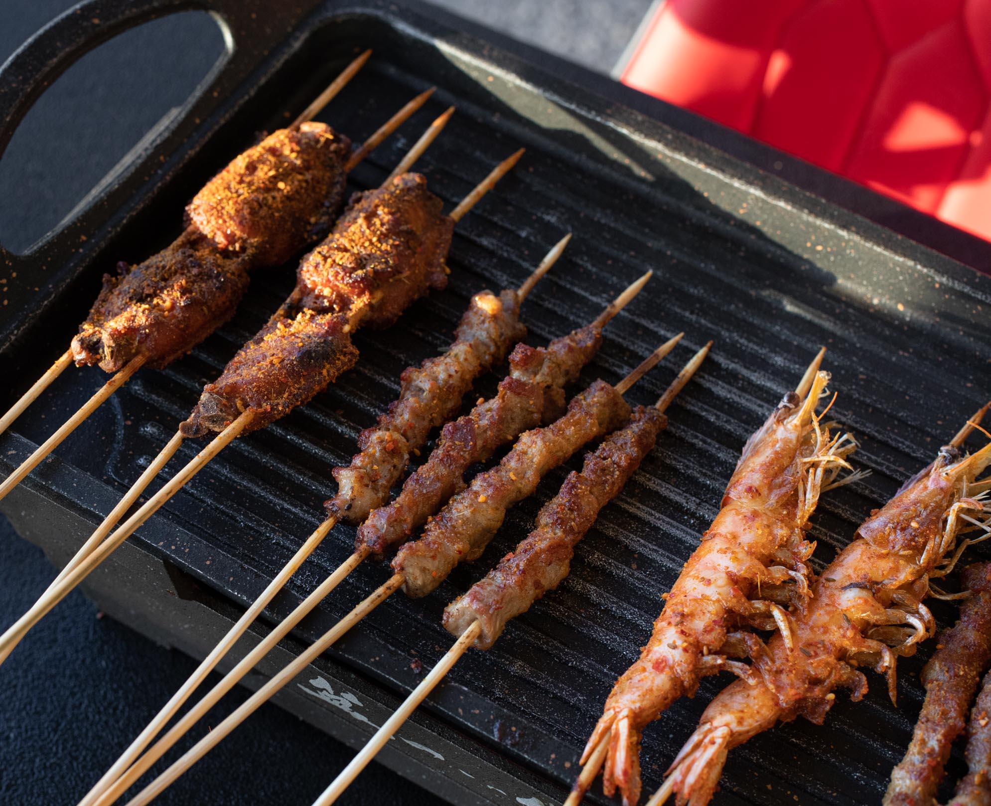 Signature Wings and Premium Lamb Belly and Jumbo Shrimp at Gui BBQ Restaurant & Bar (Photo by: Julie Nguyen/SNAP TASTE®)