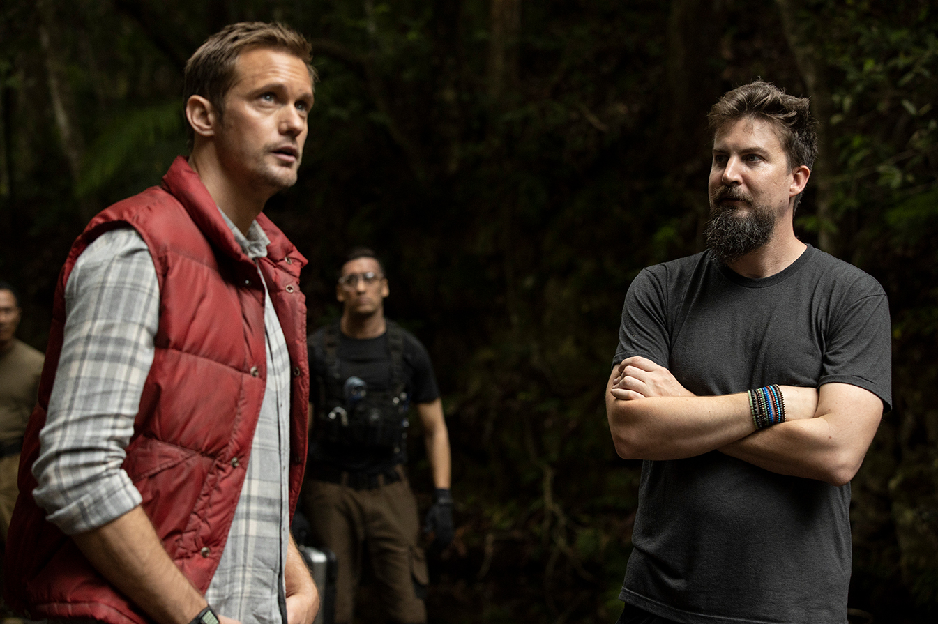 (L-r) ALEXANDER SKARSGÅRD and director ADAM WINGARD on the set of Warner Bros. Pictures’ and Legendary Pictures’ action adventure “GODZILLA VS. KONG,” a Warner Bros. Pictures and Legendary Pictures release.