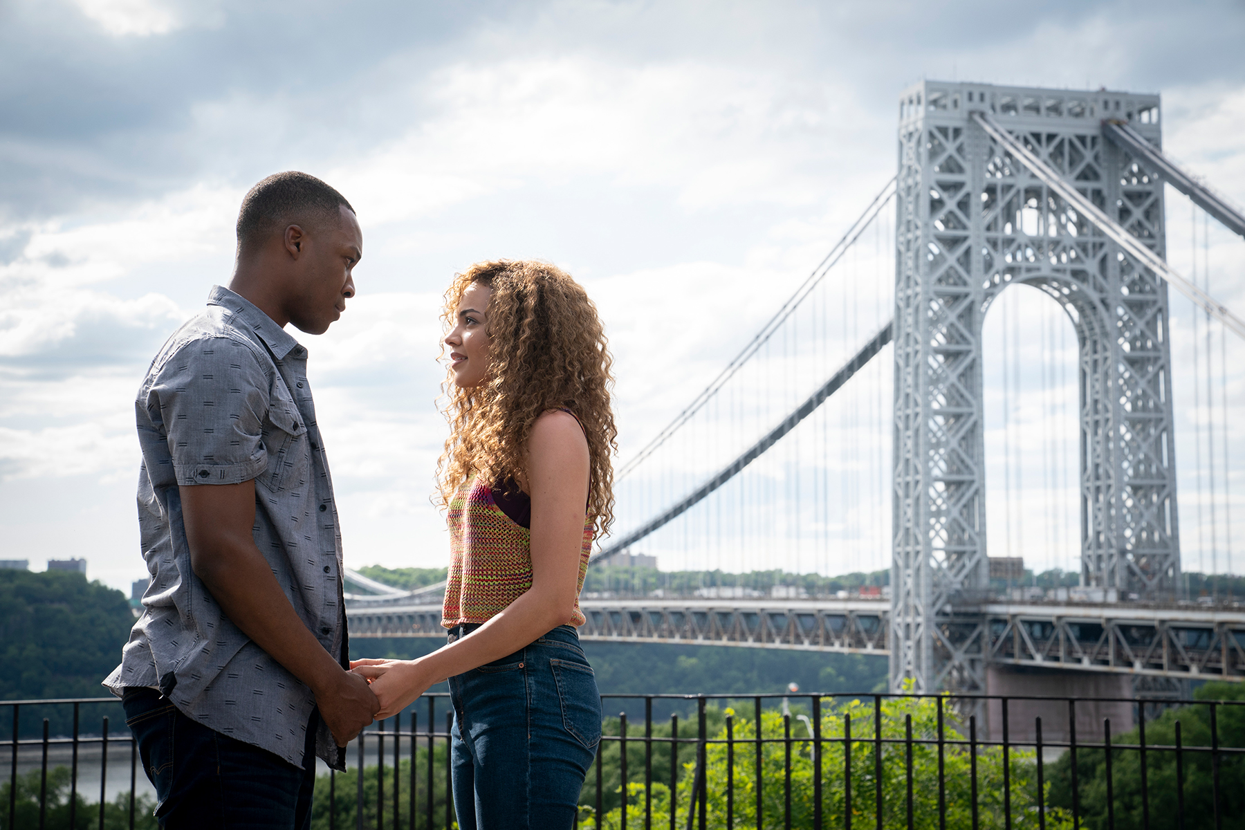 (L-r) COREY HAWKINS as Benny and LESLIE GRACE as Nina in Warner Bros. Pictures’ “IN THE HEIGHTS,” a Warner Bros. Pictures release.
