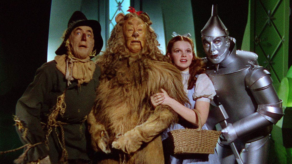 Film still, Ray Bolger, Bert Lahr, Judy Garland, and Jack Haley in THE WIZARD OF OZ (USA, 1939)