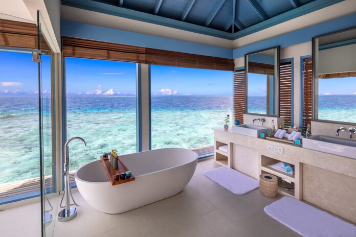 Residence main bathroom at Raffles Maldives Meradhoo