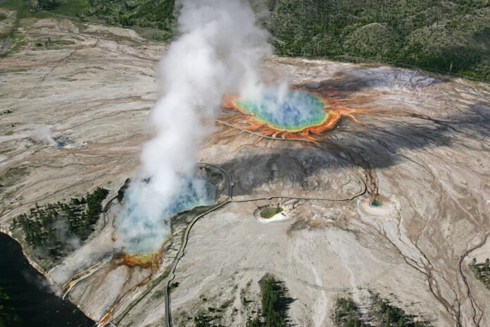 Aerial view of Excelsior Geyser and Grand Prismatic Spring, Midway Geyser Basin