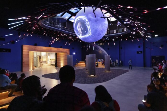 Interior image of the United States of America Pavilion with visitors, Expo 2020 Dubai.