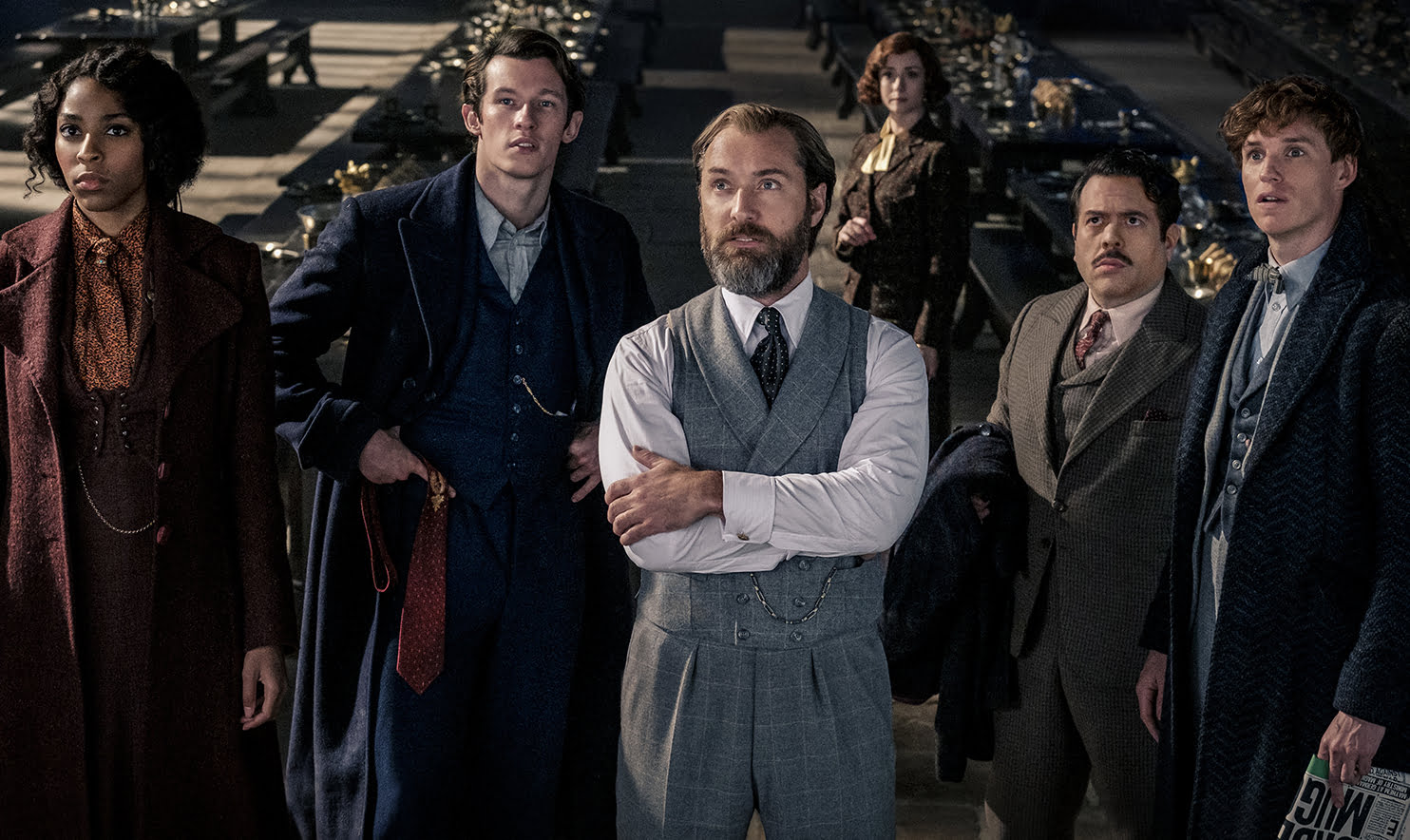 (L-R) JESSICA WILLIAMS as Eulalie “Lally” Hicks, CALLUM TURNER as Theseus Scamander, JUDE LAW as Albus Dumbledore, FIONNA GLASCOTT as Minerva McGonagall, DAN FOGLER as Jacob Kowalski and EDDIE REDMAYNE as Newt Scamander in Warner Bros. Pictures' fantasy adventure "FANTASTIC BEASTS: THE SECRETS OF DUMBLEDORE,” a Warner Bros. Pictures release.