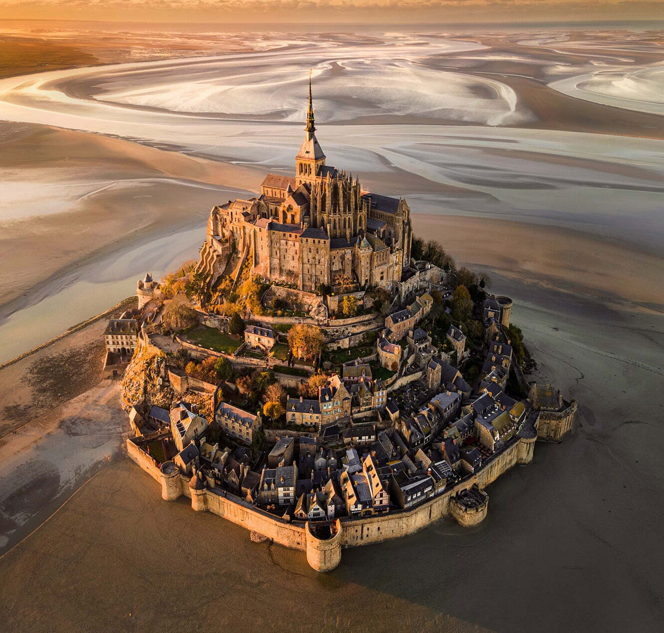 Le Mont Saint-Michel at Sunset - Photographer Name: Cigdem Ayyildiz. For me, this piece of art on the shores of Normandy is a candidate for Eighth Wonder of the World; providing a legendary view and atmosphere especially at sunset and when the tide is low. Copyright: © Cigdem Ayyildiz, Turkey, Shortlist, Open, Landscape, 2022 Sony World Photography Awards