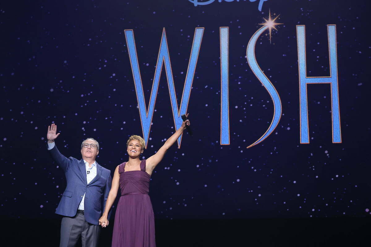 (L-R) Alan Bergman, Chairman Disney Studios Content, and Ariana DeBose speak onstage during D23 Expo 2022 at Anaheim Convention Center in Anaheim, California on September 09, 2022.