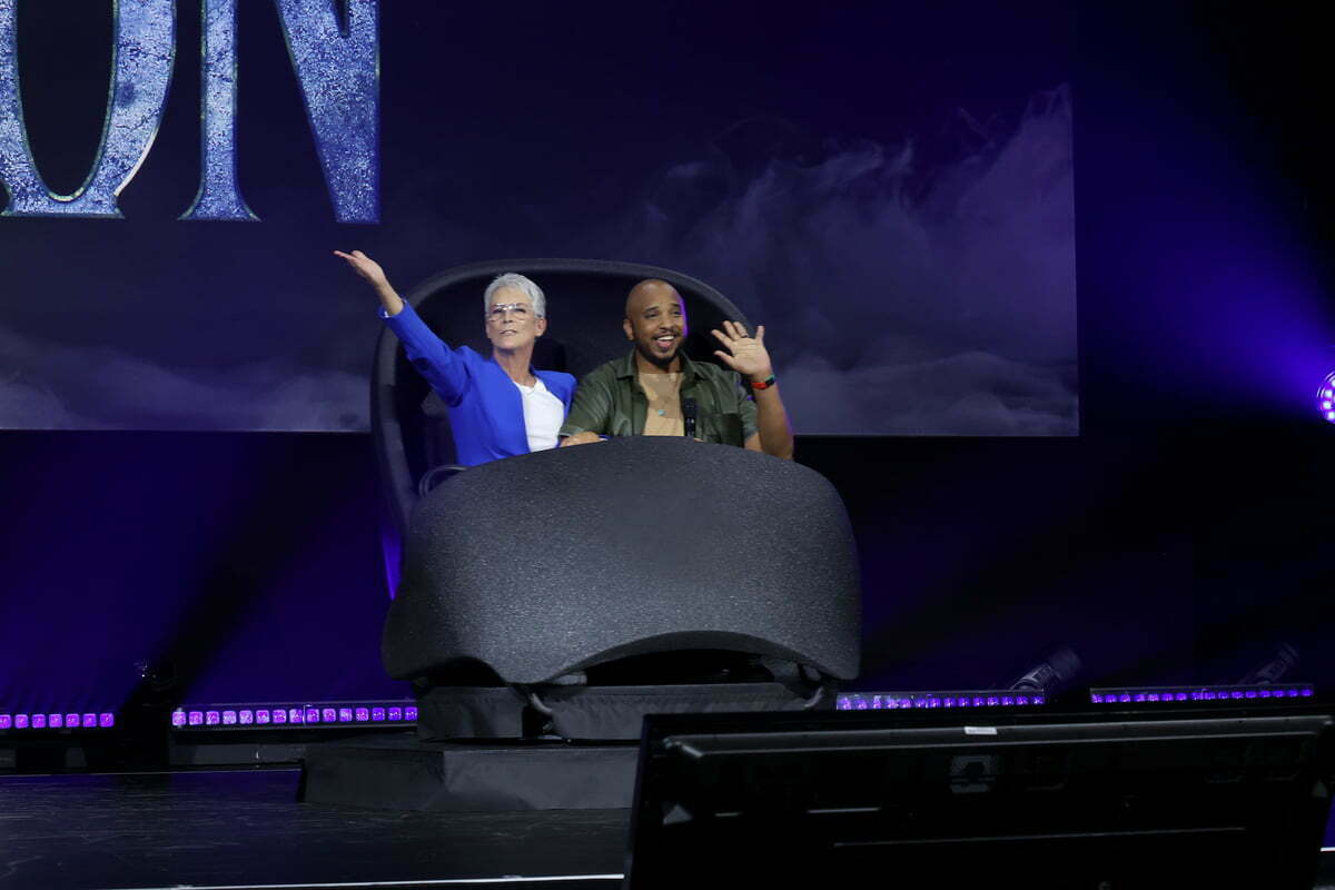 (L-R) Jamie Lee Curtis and Justin Simien speak onstage during D23 Expo 2022 at Anaheim Convention Center in Anaheim, California on September 09, 2022