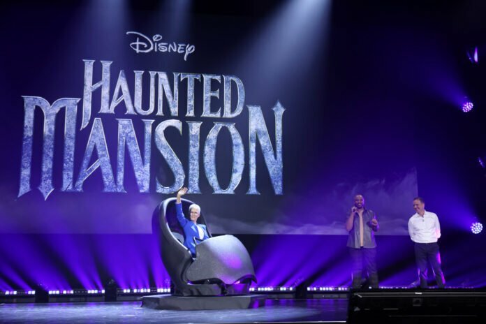 (L-R) Jamie Lee Curtis, Justin Simien, and Sean Bailey speak onstage during D23 Expo 2022 at Anaheim Convention Center in Anaheim, California on September 09, 2022