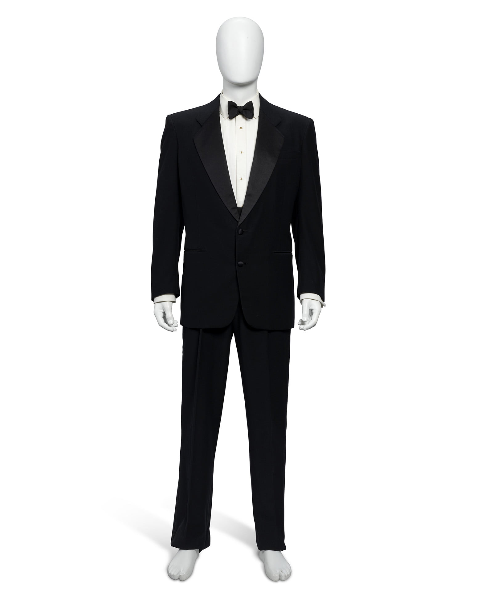 ICENCE TO KILL (1989) A BLACK SINGLE-BREASTED TUXEDO WORN BY TIMOTHY DALTON  AS JAMES BOND AND SIGNED ON INSIDE JACKET LINING