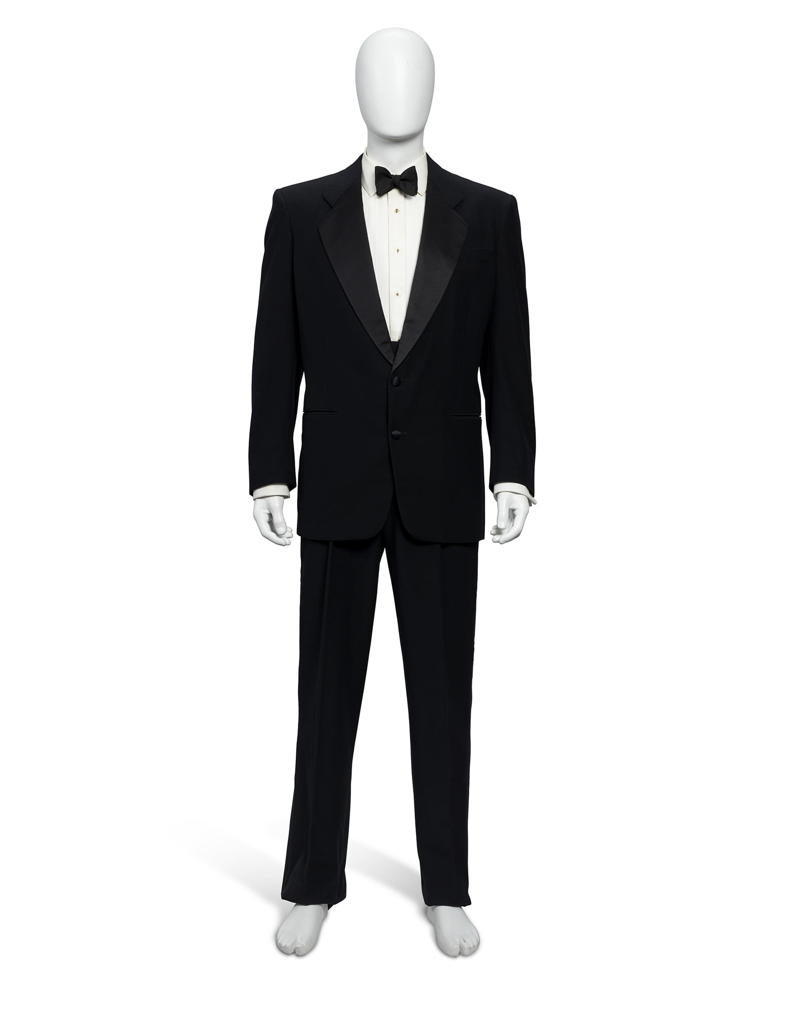 ICENCE TO KILL (1989) A BLACK SINGLE-BREASTED TUXEDO WORN BY TIMOTHY DALTON AS JAMES BOND AND SIGNED ON INSIDE JACKET LINING