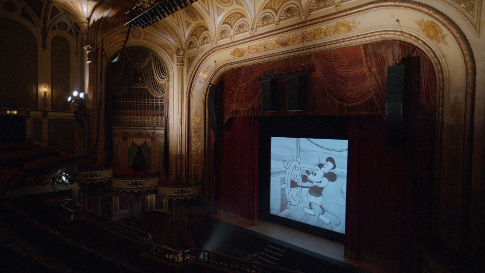 Steamboat Willie plays on the big screen.
