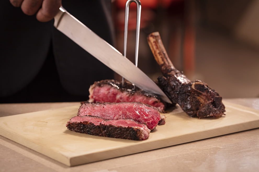 CUT U.S.D.A. Prime Aged 21 Days Bone In Ribeye Steak