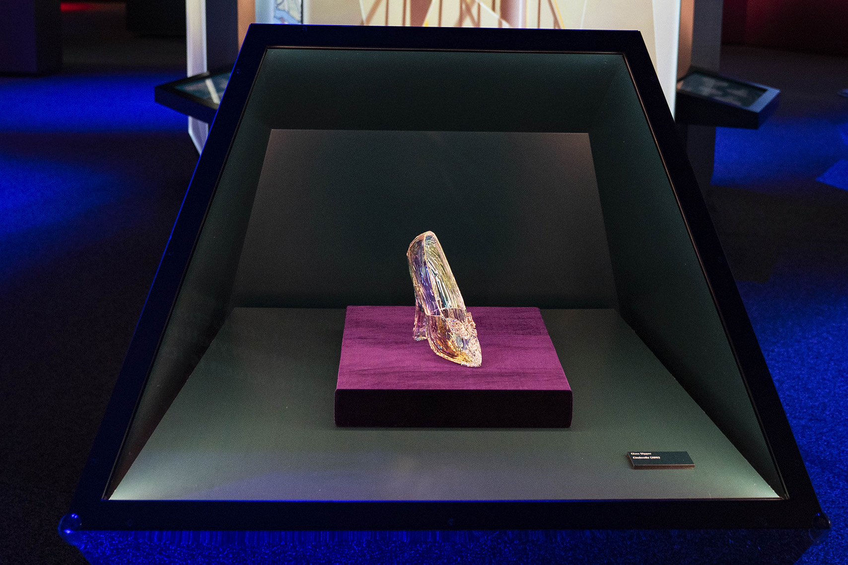 Glass slipper from the live-action Cinderella (2015) on display at Disney100: The Exhibition, now open at The Franklin Institute in Philadelphia. ©Disney