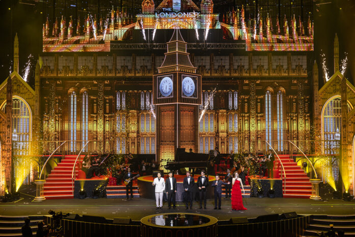 Guests of honor gather on stage at the end of the official Grand Celebration event for The Londoner Macao Thursday.