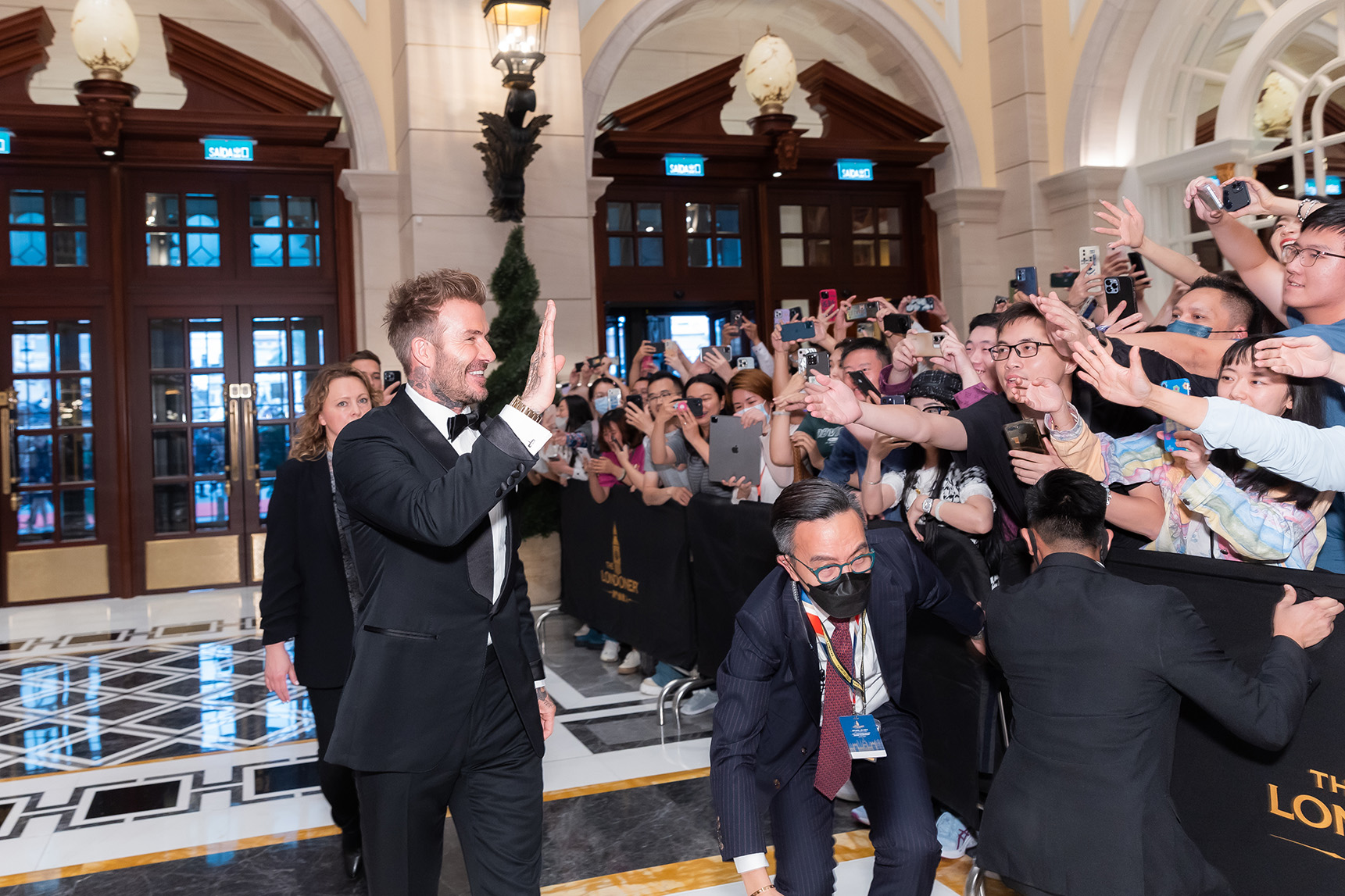 UK soccer icon and Sands global ambassador David Beckham stops at the red carpet during The Londoner Macao Grand Celebration event at The Londoner Arena Thursday.