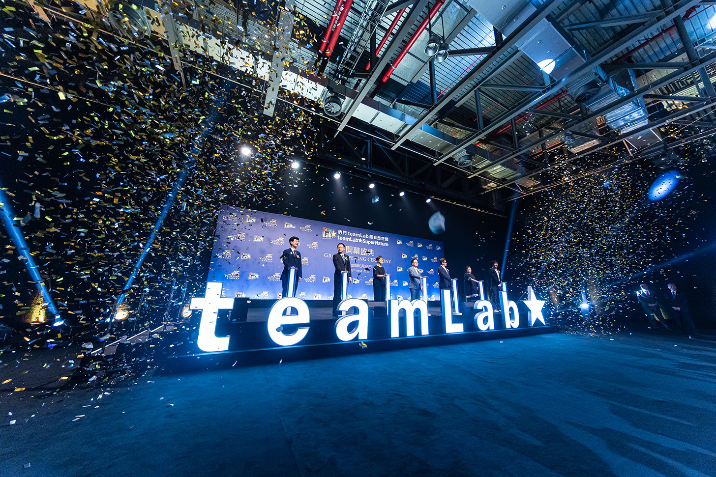 teamLab SuperNature Macao held its grand opening ceremony on May 26 at The Venetian® Macao’s Cotai Expo.
 
Officiating at the ceremony were (left to right): Grant Chum, Chief Operating Officer of Sands China Ltd.; Yang Yi, Deputy Director of the Economic Affairs Department of the Liaison Office of the Central People’s Government in the Macao SAR; Maria Helena de Senna Fernandes, Director of the Macao Government Tourism Office; Dr. Wilfred Wong, President of Sands China Ltd.; Cheang Kai Meng, Vice President of the Cultural Affairs Bureau of the Macao SAR Government; Elaine Wong, Senior Manager of the Promotional Activities and Development of Conventions and Exhibitions Department of the Macao Trade and Investment Promotion Institute; and Toshiyuki Inoko, founder of teamLab.
