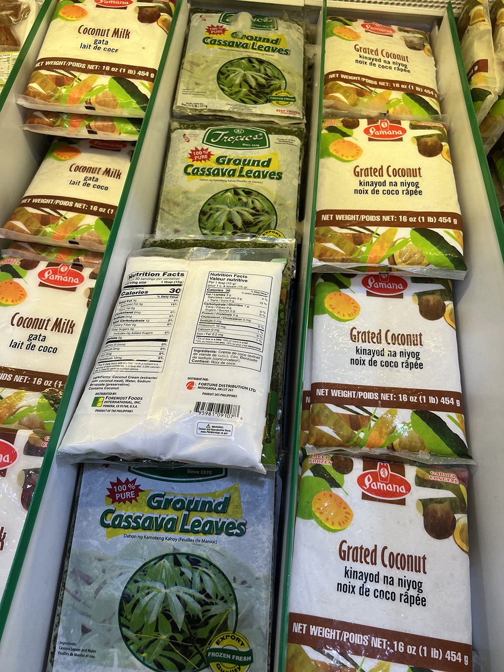 Cassava leaves and grated coconut - Seafood City Supermarket in Irvine, California - Photo by Julie Nguyen