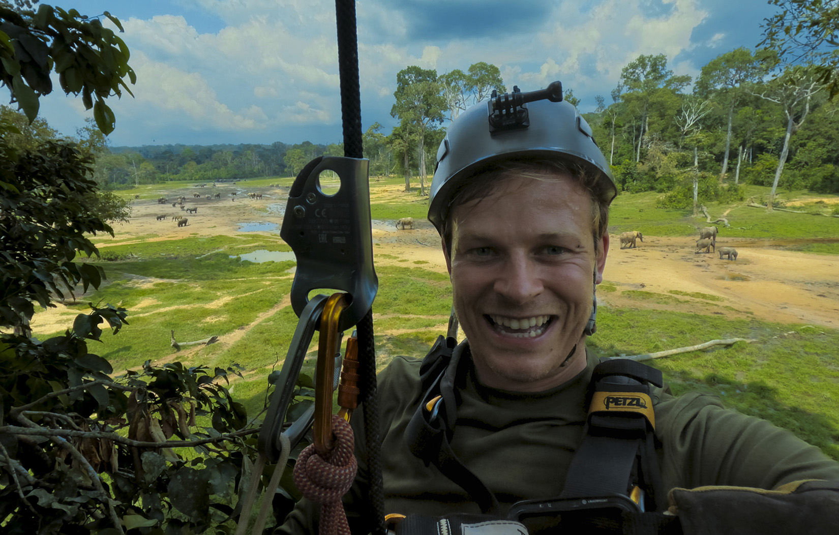 Bertie Gregory and Ngbanda Bathelomie viewing the drones images when flying.