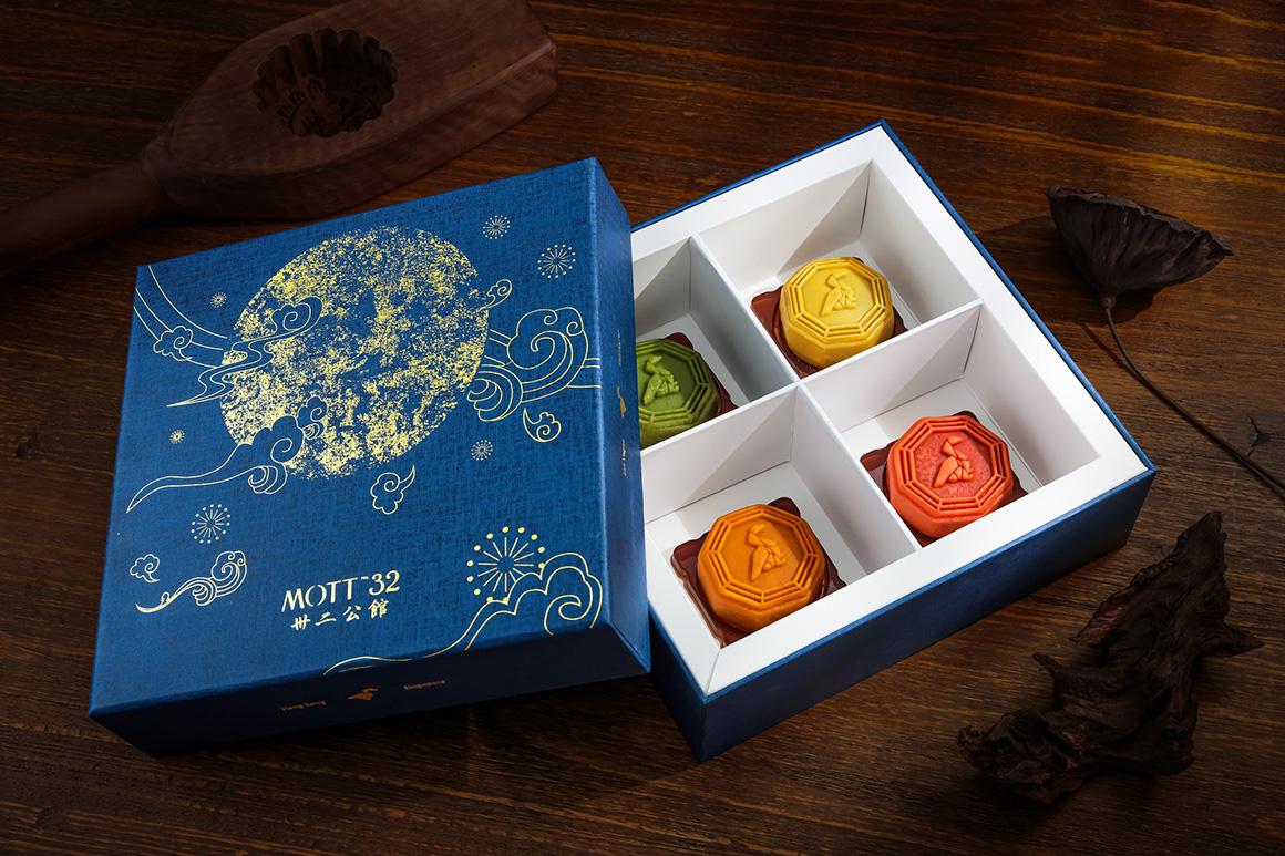 Mott 32 mooncakes are elegantly presented in a premium blue box with distinctive gold embroidery