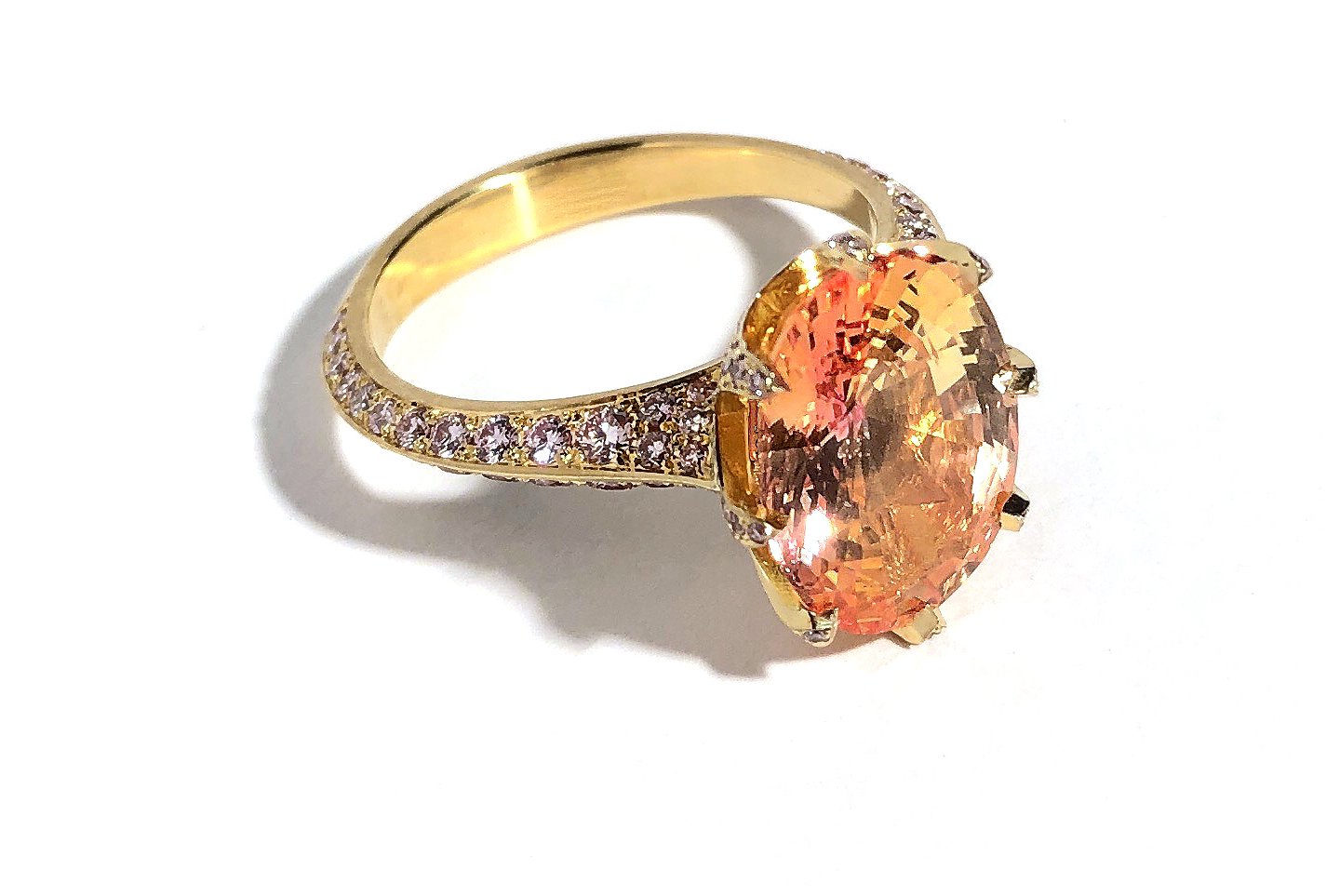Padparadscha Ring by Geoffrey Good - 7.31 ct. padaparadscha with diamond melee, set in 18K yellow gold and 20K pink gold