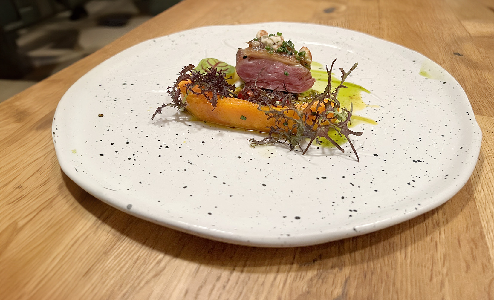 Sonoma County Duck Breast with Squash, Pistachio, Date Butter and Seeds at Kali Restaurant in Los Angeles (Photo by Julie Nguyen)