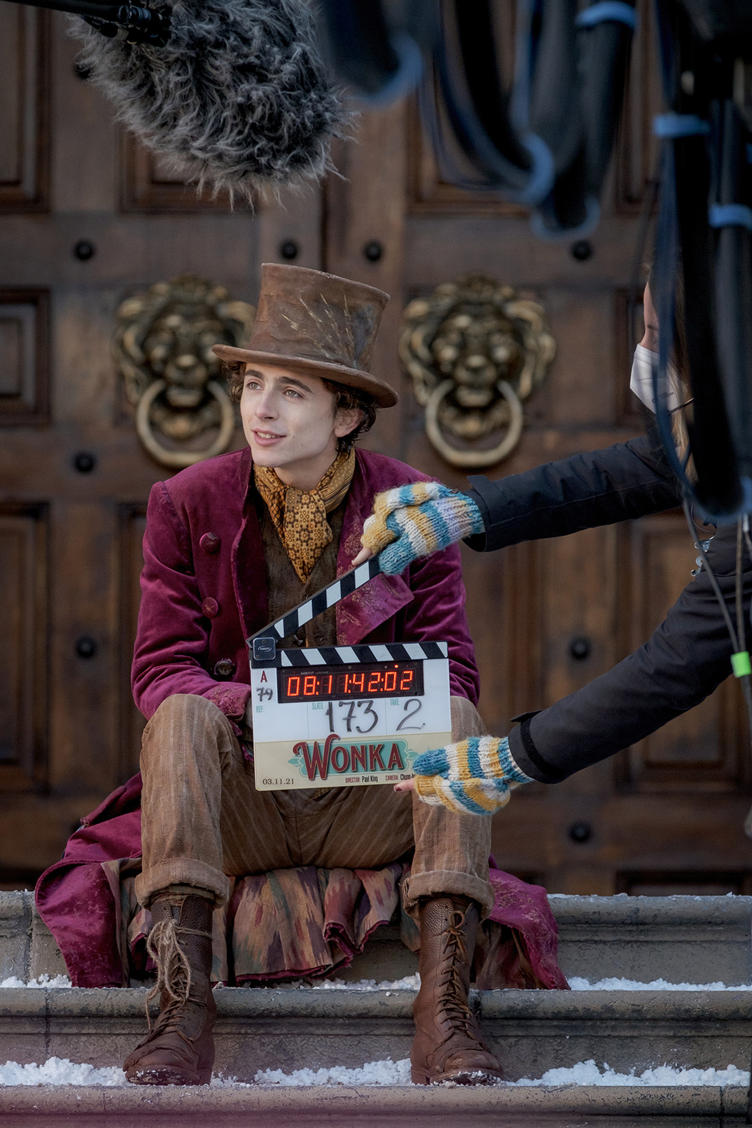 TIMOTHÉE CHALAMET as Willy Wonka and director PAUL KING on the set of Warner Bros. Pictures and Village Roadshow Pictures’ “WONKA,” a Warner Bros. Pictures release.