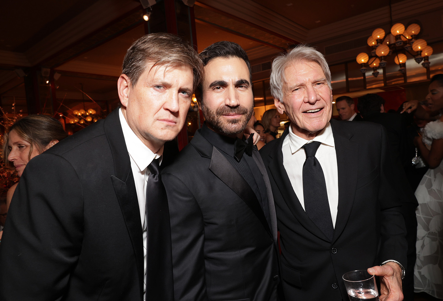 (L-R) Bill Lawrence, Brett Goldstein and Harrison Ford seen at the Apple TV+ Emmy Awards post ceremony reception at Mother Wolf on January 15, 2024 in Los Angeles, California.