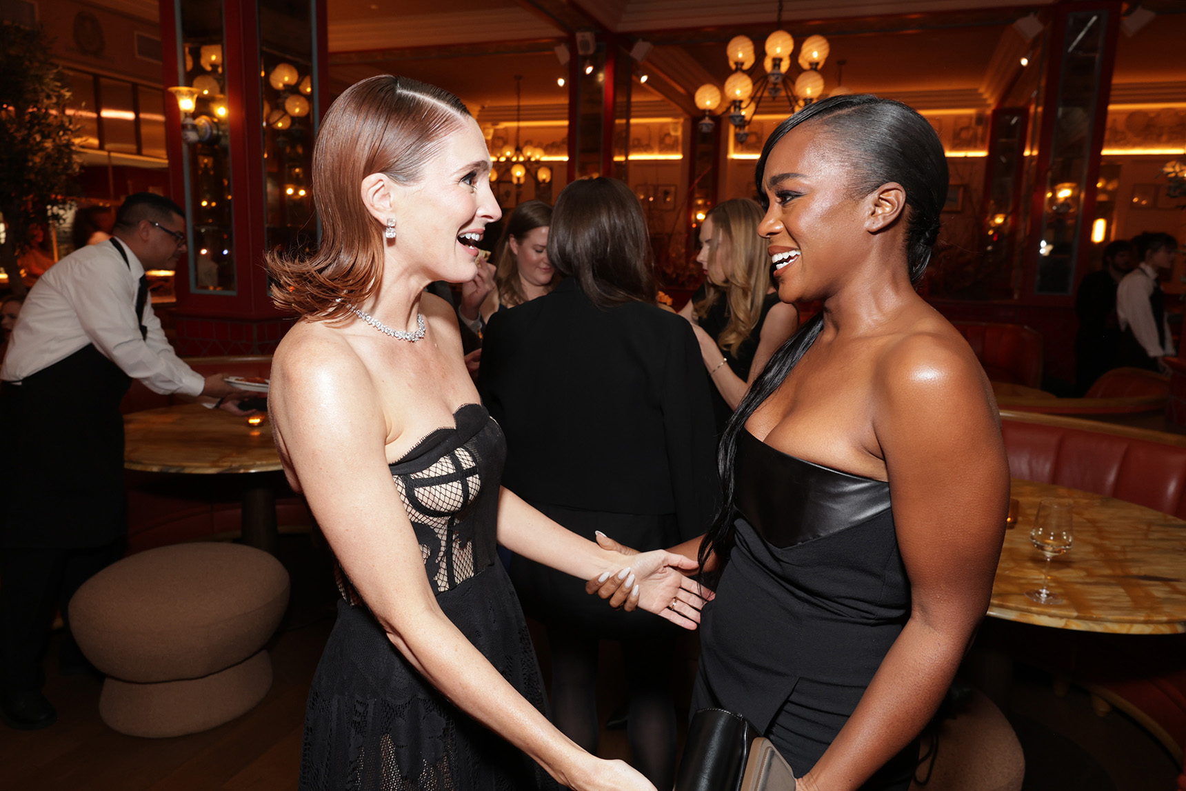 Stephanie Koenig (L) and Aja Naomi King seen at the Apple TV+ Emmy Awards post ceremony reception at Mother Wolf on January 15, 2024 in Los Angeles, California. 