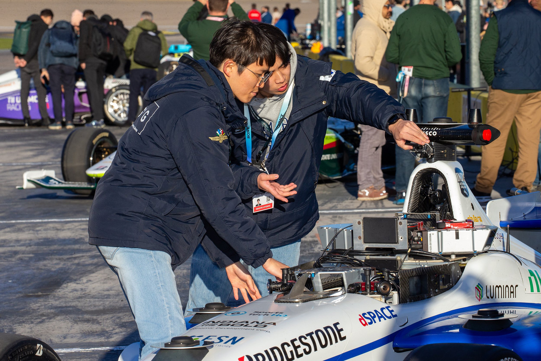 The KAIST students (Korean Advanced Institute of Science and Technology) with their car at the Autonomous Challenge CES 2024