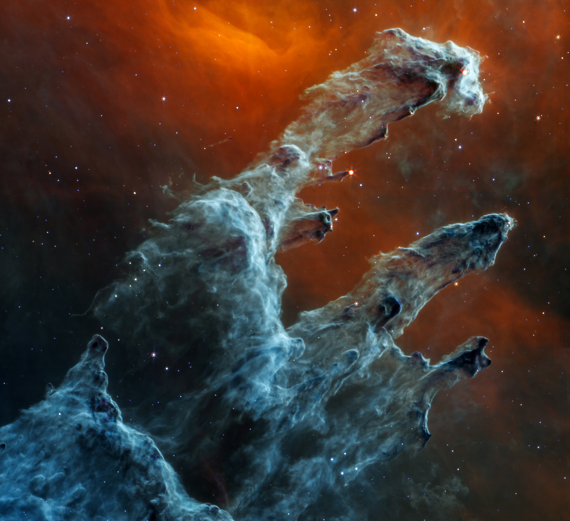 Featured in the IMAX® documentary DEEP SKY, JWST’s mid-infrared view of the Pillars of Creation strikes a chilling tone. Thousands of stars that exist in this region disappear – and seemingly endless layers of gas and dust become the centerpiece. The detection of dust by Webb’s Mid-Infrared Instrument (MIRI) is extremely important – dust is a major ingredient for star formation. 