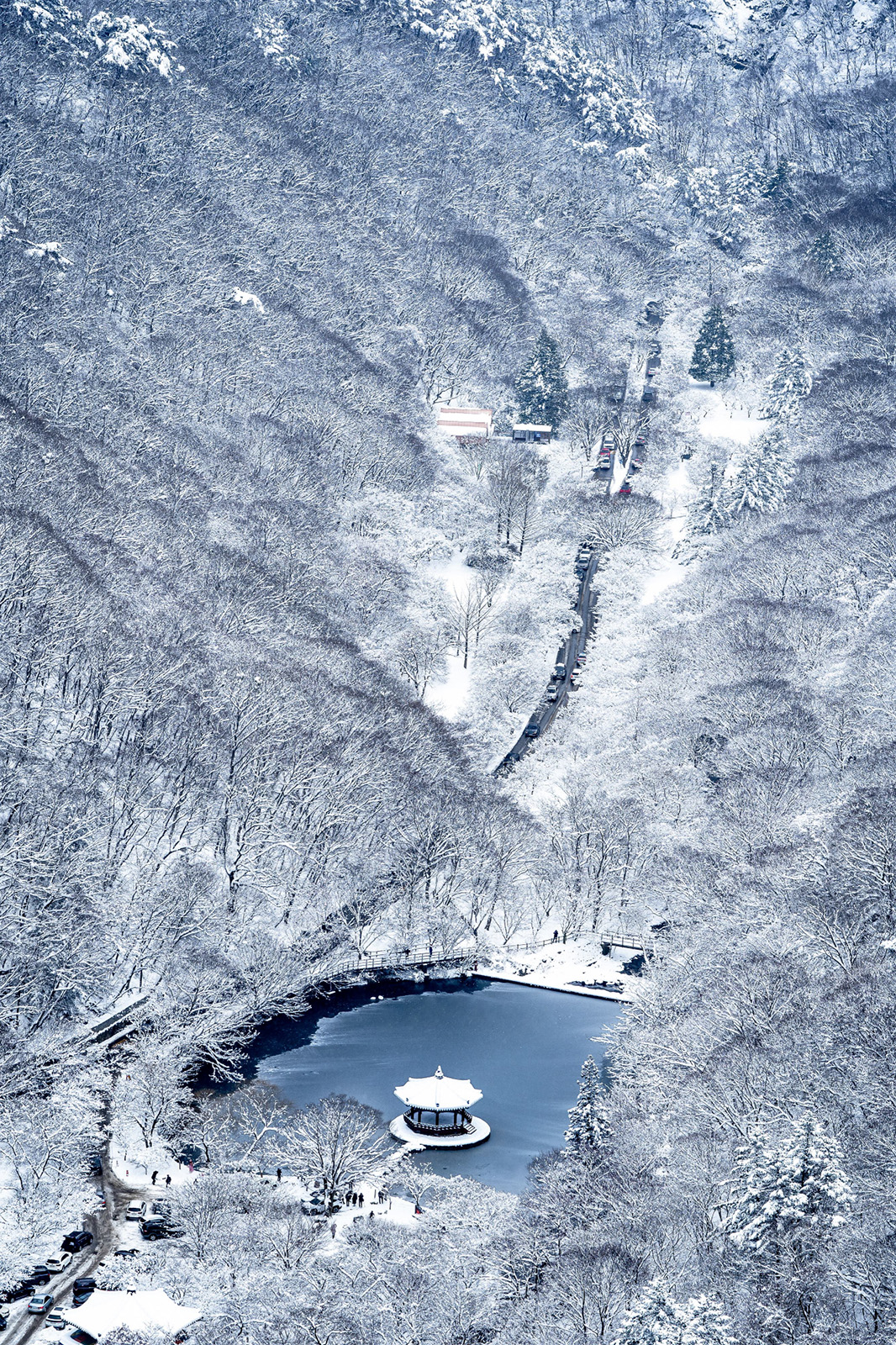 This is a breathtaking winter view of Uhwajeong Pavilion, in Naejangsan National Park, South Korea. The snow-covered landscape transforms the scene into a tranquil masterpiece reminiscent of a traditional Korean ink wash painting, created using shades of ink without adding colours. The hills and the serene lake create a harmonious balance, showing the beauty of Korea’s natural wonders.  Copyright: © Gilyoung Pyo, Korea, Republic Of, 2nd Place, National Awards, Sony World Photography Awards 2025