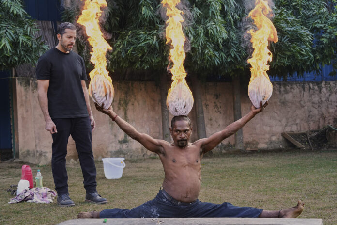 Fire Ramesh performs his routine for David Blaine.