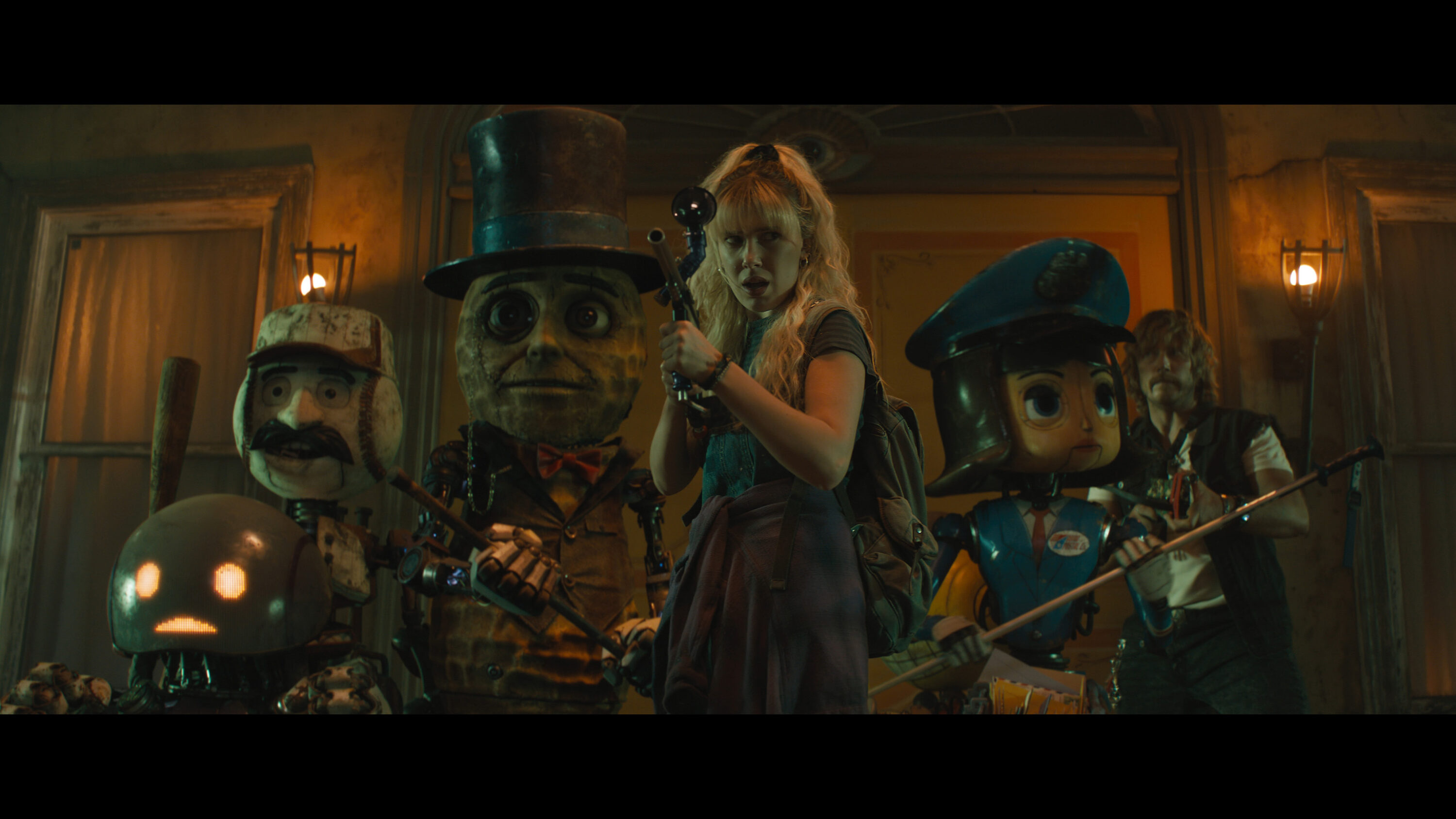 The Electric State. (L to R) Herman (voiced by Anthony Mackie), PopFly (voiced by Brian Cox), Mr. Peanut (voiced by Woody Harrelson), Michelle (Millie Bobby Brown), Penny Pal (voiced by Jenny Slate) and Keats (Chris Pratt) in The Electric State. ™/© 2024 Netflix.