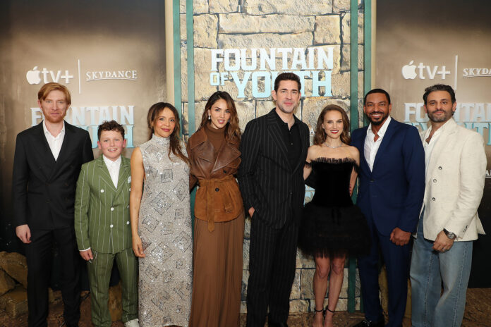 (L-R) Domhnall Gleeson, Benjamin Chivers, Carmen Ejogo, Eiza González, John Krasinski, Natalie Portman, Laz Alonso and Arian Moayed attends the World Premiere screening of Apple Original Films’ “Fountain of Youth” at the American Museum of Natural History.
