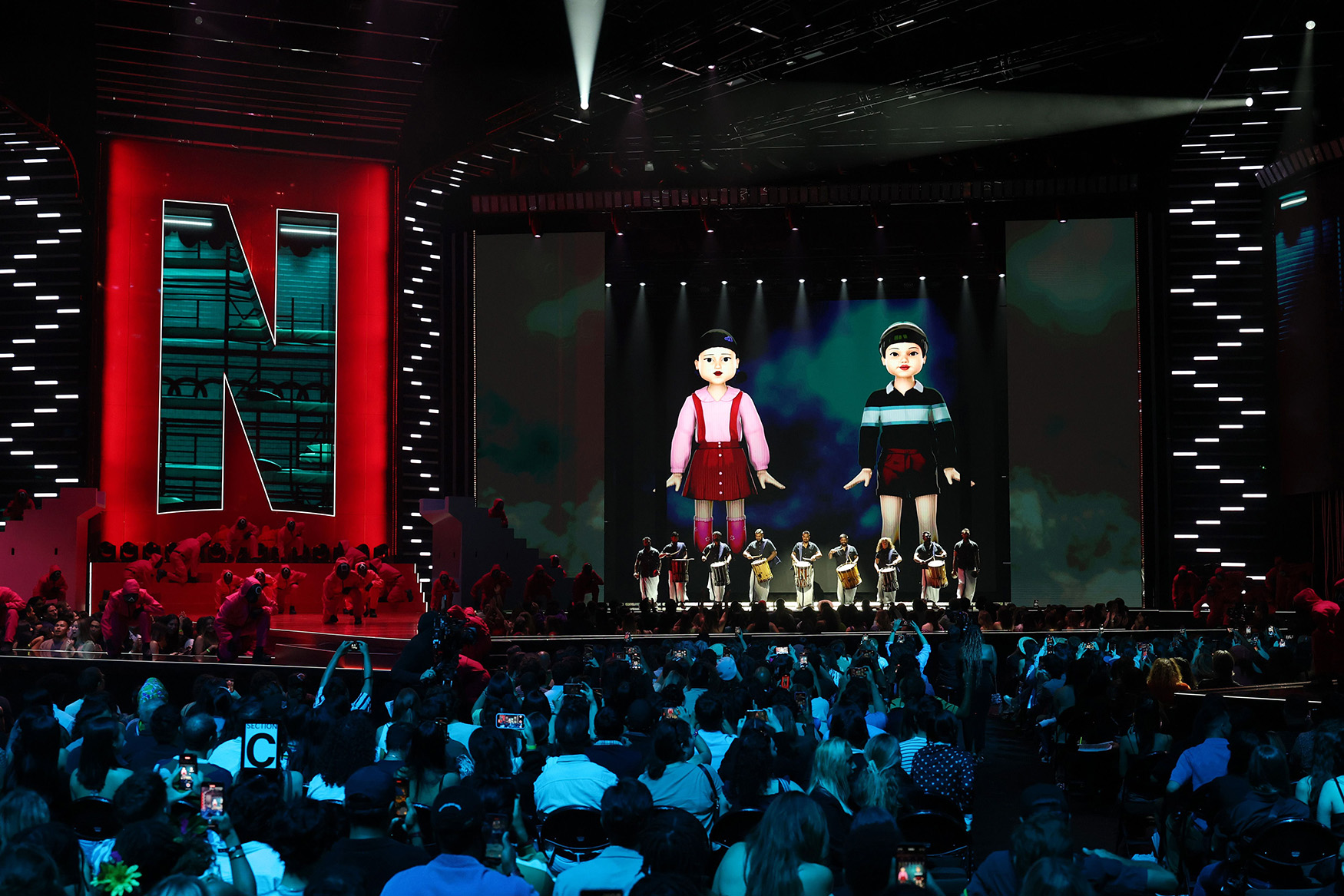 Pink Guards of Squid Games perform onstage during NETFLIX TUDUM 2025: THE LIVE EVENT at The Kia Forum on May 31, 2025 in Inglewood, California.