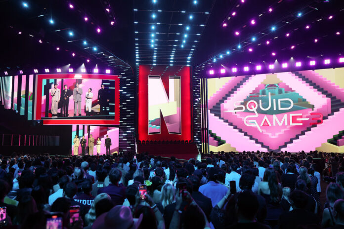 (L-R) Lee Jung-jae, Lee Byung-hun, Park Sung-hoon, Kang Ae-shim, and Choi Seung-hyun speak onstage during NETFLIX TUDUM 2025: THE LIVE EVENT at The Kia Forum on May 31, 2025 in Inglewood, California.