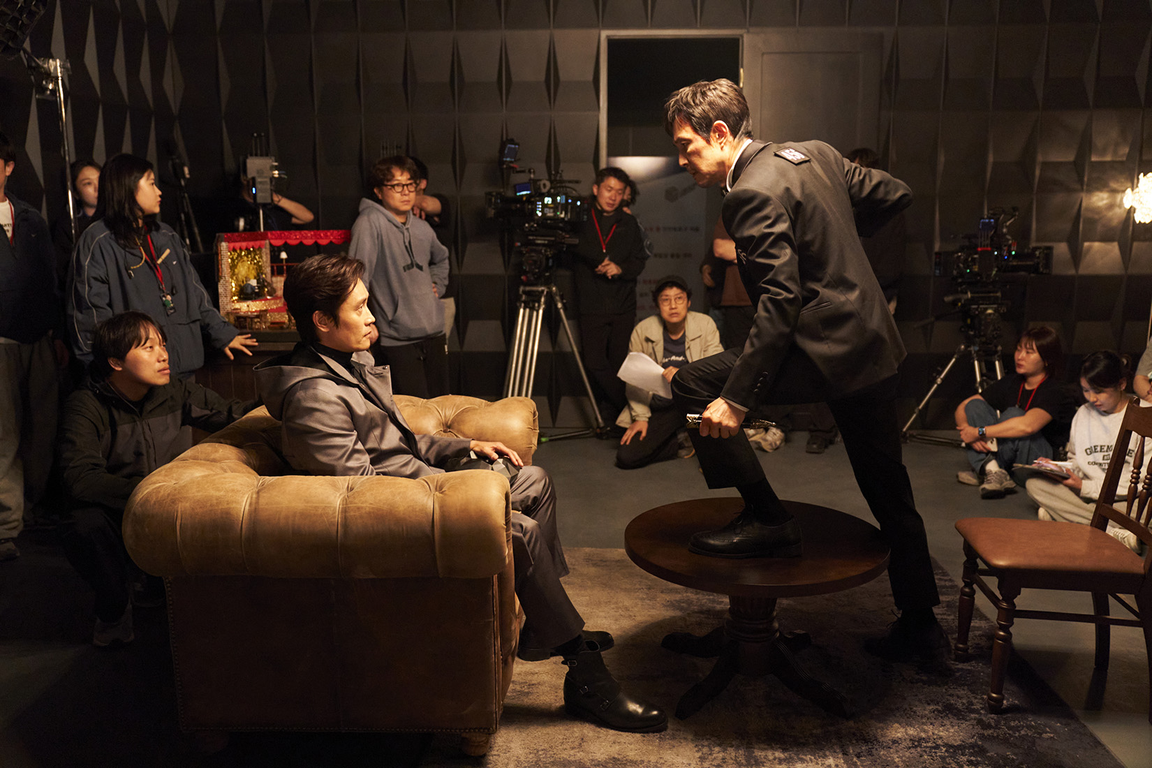 Squid Game S3 (L to R) Lee Byung-hun as Frontman, Director Hwang Dong-hyuk, Lee Jung-jae as Seong Gi-hun in Squid Game S3 Cr. No Ju-han/Netflix © 2025