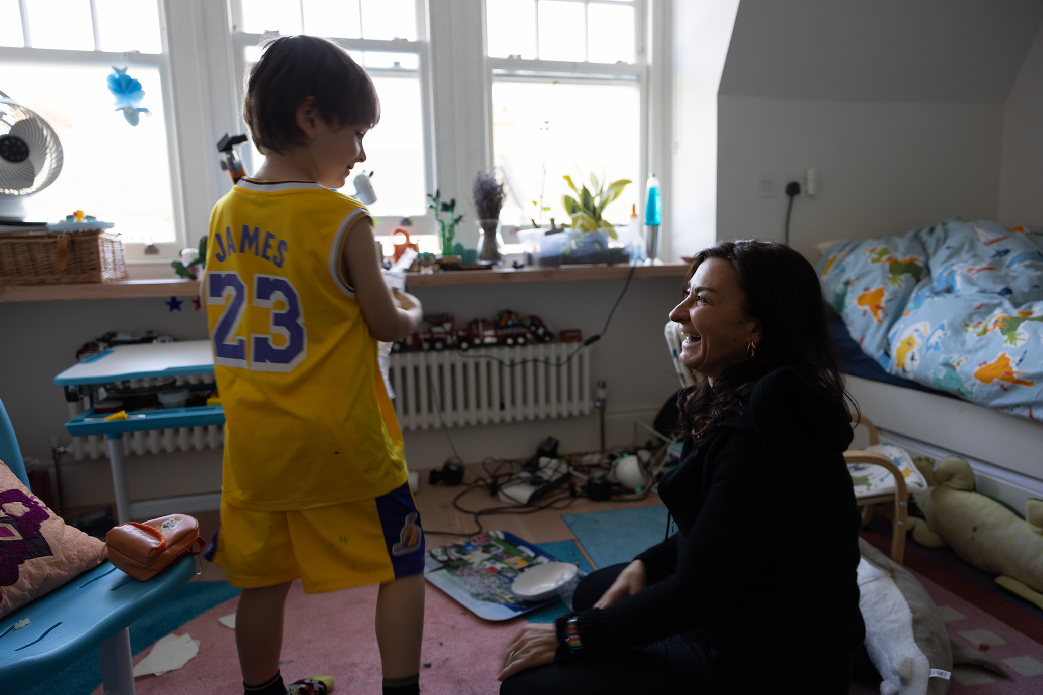 Lynsey Addario at home with her son Alfred before leaving on assignment.