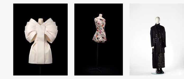 (Left): Dice Kayek (French, established 1992), Magnolia dress, 2009. Silk gauze; 26 x 25 x 35 x 28 in. Denver Art Museum: Gift of Dice Kayek, 2024.894. (Middle): Comme des Garçons , Coat Dress, Spring/Summer 2018. Digital printed cotton gabardine with silk ribbons. Denver Art Museum: Funds from the Florence R. and Ralph L. Burgess Trust, 2020.179. (Right): Yohji Yamamoto, (Japanese, b. 1943), Jacket, shirt and pants, Fall-Winter 2019. Jacket and shirt: Wool with rayon-thread machine embroidery; pants: printed wool. Denver Art Museum: Gift of Ricardo Zaragoza, 2025.220A-C.