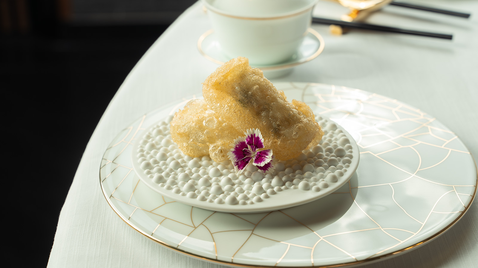 Deep-fried spring rolls with betel leaves, fish maw, and lobster at Yu Ting Yuan